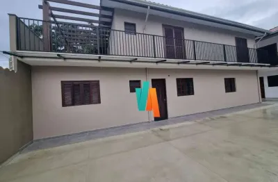 Sobrado com 3 dormitórios à venda, 122 m² por R$ 650.000 - Indaiá - Caraguatatuba/SP