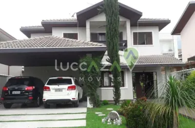 Casa de luxo em condomínio com 4 suítes no jardim altos de santana ii, jacareí-sp: 406m², 3 salas e 2 vagas de garagem.