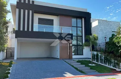 Tauá - tangará - casa alto padrão à venda no parque tauá tangará em londrina, com 3 quartos, sendo 3 suítes.