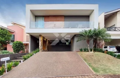 Royal forest - casa alto padrão à venda no condomínio royal forest em londrina. porteira fechada com 360m² de área construída e 4 suítes.