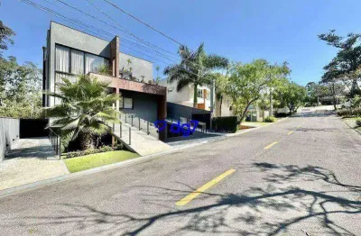 Casa em condomínio de alto padrão na granja viana, com 4 suítes e 8 vagas, 483 m²!