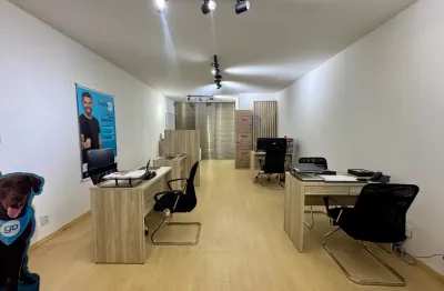 Sala comercial no ed. presidente localizado na av. presidente kennedy em campinas, são josé/sc.