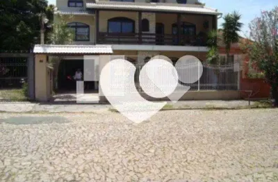Casa com 6 quartos à venda na Rua Paissandu, 467, Partenon, Porto Alegre