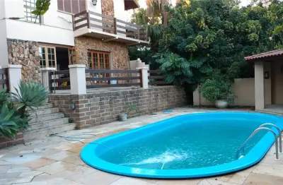 Casa em condomínio fechado com 4 quartos à venda na Avenida da Cavalhada, 5205, Cavalhada, Porto Alegre