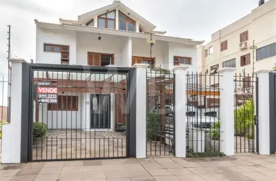 Casa com 4 quartos à venda na Avenida Karl Iwers, Jardim Planalto, Porto Alegre