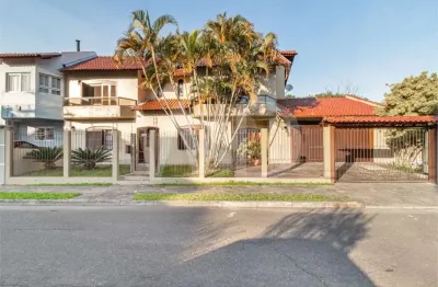 Casa com 4 quartos à venda na Rua Ernesto Zamprogna, Alto Petrópolis, Porto Alegre