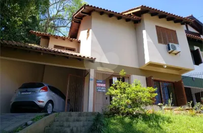 Casa com 3 quartos à venda na Rua Edgar Luiz Schneider, Ipanema, Porto Alegre
