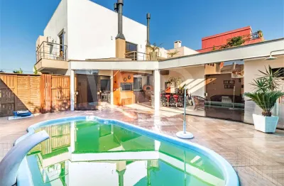 Casa em condomínio fechado com 3 quartos à venda na Avenida Edgar Pires de Castro, Hípica, Porto Alegre