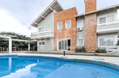 Casa em condomínio fechado com 3 quartos à venda na Avenida Edgar Pires de Castro, Hípica, Porto Alegre