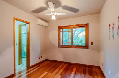 Casa com 3 quartos à venda na Estrada Afonso Lourenço Mariante, Vila Nova, Porto Alegre