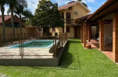 Casa com 4 quartos à venda no laranjal, pelotas , 690 m2 por r$ 1.200.000