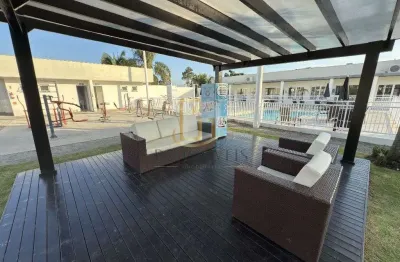 Apartamento com 2 dormitorios em condominio clube no itacolomi - balneario picarras.