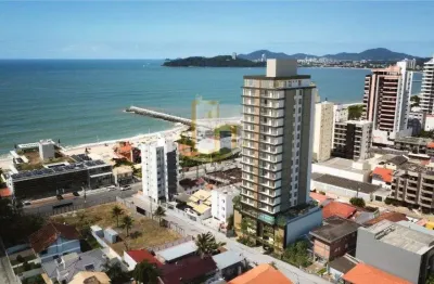 Apartamento de 2 dormitorios sendo 2 suites a 200 metros do mar no centro de balneario picarras.