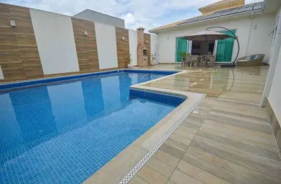 Casa de condomínio para venda possui 375 metros quadrados com 4 quartos