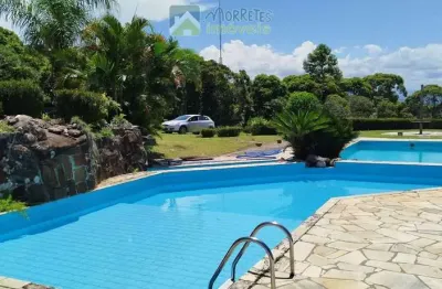 Terreno em condomínio fechado com 450m² acesso a piscinas e vista para o mar em antonina