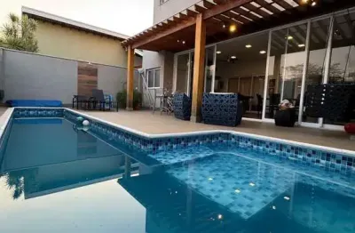 Jd flamboyants belíssimo sobrado de alto padrão com 04 suítes, cinema, espaço relax piscina e spa.