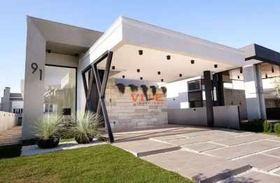 Casa à venda de 03 dormitórios suítes no condomínio alphaville gravataí/rs