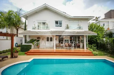 Casa para locação no tamboré 3 com 518 m² de área útil 4 suítes e 6 vagas de garagem