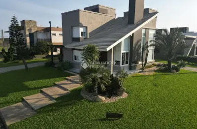 Casa em condomínio fechado com 4 quartos à venda na do mar, 3300, condomínio lagoa do passo, osório, 247 m2 por r$ 2.700.000