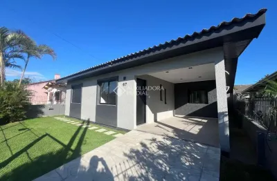 Casa com 3 quartos à venda na presidente castelo branco, 67, caravagio, osório, 145 m2 por r$ 590.000