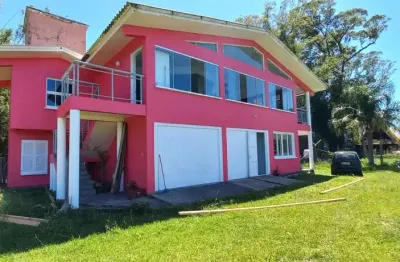 Casa com 3 quartos à venda na br-101, 455, costa verde, osório, 250 m2 por r$ 2.250.000