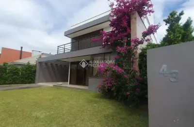 Casa em condomínio fechado com 3 quartos à venda na da lagoa, 1111, farroupilha, osório, 460 m2 por r$ 1.800.000