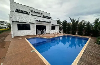 Casa com vista privilegiada para represa no condomínio: sobrado de 265m², piscina, área gourmet e 5