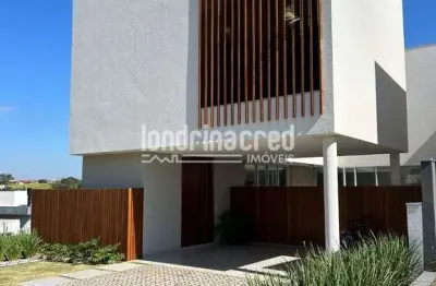 Casa de alto padrão em condomínio na região leste de londrina, com 3 suítes, piscina, energia solar