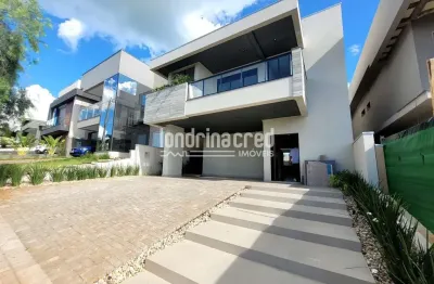 Casa de alto padrão com piscina aquecida no condomínio aranguá tauá – sofisticação e qualidade de v