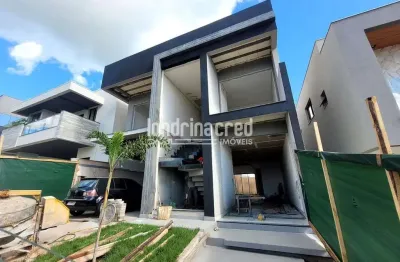 **casa alto padrão no condomínio aranguá com 4 dormitórios, 3 suítes, 5 banheiros, 4 vagas, 235m² c