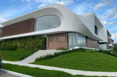 Casa em curvas, próximo ao mar. projeto de rafael castro.