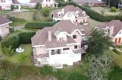 Casa em condomínio fechado com 5 quartos à venda no jardim atalaia, campos do jordão  por r$ 1.850.000