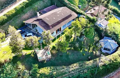 Casa com 4 quartos à venda no alto da vila inglesa, campos do jordão  por r$ 1.100.000