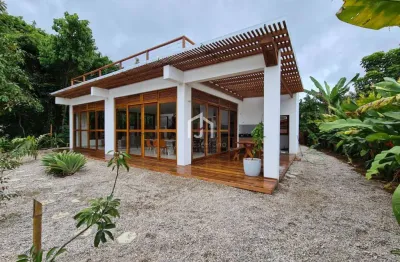 Casa em condomínio fechado com 4 quartos à venda na praia do itamambuca, ubatuba  por r$ 3.600.000
