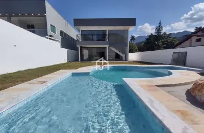 Casa em condomínio fechado com 4 quartos à venda em horto florestal, ubatuba  por r$ 1.390.000