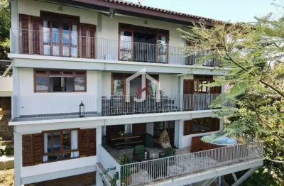 Casa com 4 quartos à venda em itaguá, ubatuba  por r$ 3.750.000