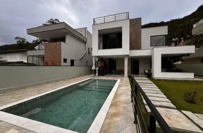 Casa em condomínio fechado com 4 quartos à venda na praia da lagoinha, ubatuba  por r$ 3.200.000