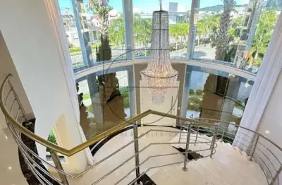 Casa com 4 quartos à venda na avenida dos dourados, 210, jurerê internacional, florianópolis por r$ 7.900.000