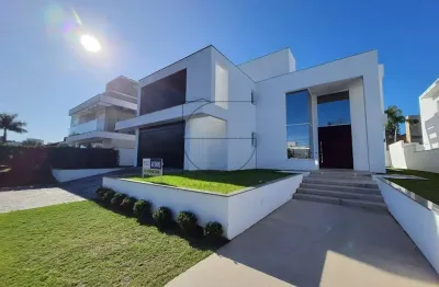Casa com 4 quartos à venda na avenida dos búzios, 2680, jurerê internacional, florianópolis por r$ 7.750.000