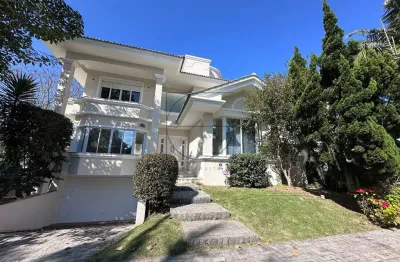 Casa com 4 quartos à venda na Rua das Tibiras, 241, Jurerê Internacional, Florianópolis por R$ 5.499.000