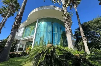 Casa em condomínio fechado com 5 quartos à venda na avenida dos dourados, 508, jurerê internacional, florianópolis por r$ 7.500.000