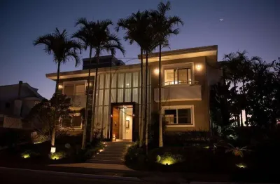 Casa com 4 quartos à venda na rua graciliano manoel gomes, 494, jurerê internacional, florianópolis por r$ 5.800.000