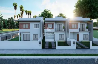 Dois sobrados (meio de quadra) 3 dormitórios sendo 1 suíte com sacada localizado em barra velha - sc