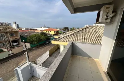 Apartamento vista mar, mobiliado, 3 quartos sendo 1 suíte, garagem coberta