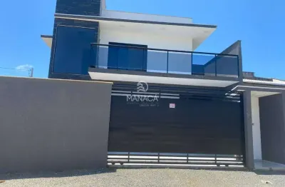 Sobrado com 4 quartos sendo um suíte, painel solar, piscina aquecida e muito mais!! Localizado em Barra Velha - SC