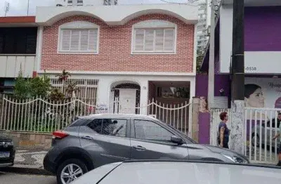 Sobrado com 4 dormitórios para alugar, 200 m² por r$ 10.600,00/mês - gonzaga - santos/sp