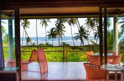 Carnaval praia do forte casa beira-mar com 4 suítes alto padrão aluguel diária