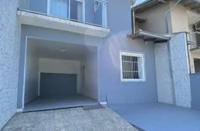 Sobrado Geminado para Venda em Joinville, Nova Brasília, 3 dormitórios, 1 suíte, 3 banheiros, 2 vagas
