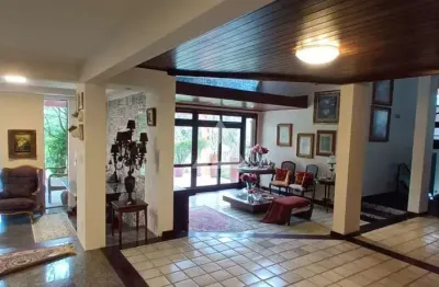 Casa no condomínio encontro das águas com 6 quartos e 4 suítes, 377,00 m² à venda por r$ 3.270.000,00 -  lauro de f