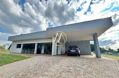 Casa à venda em condomínio com 3 suítes, 250 m² e amplo terreno – estância cabral – londrina/pr